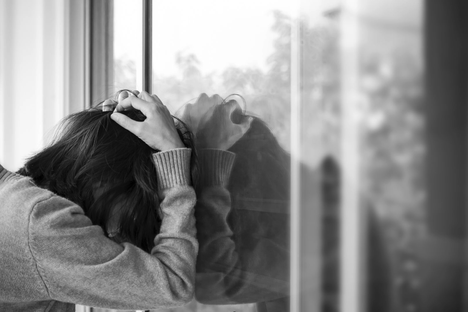 Woman experiencing a mental health crisis.